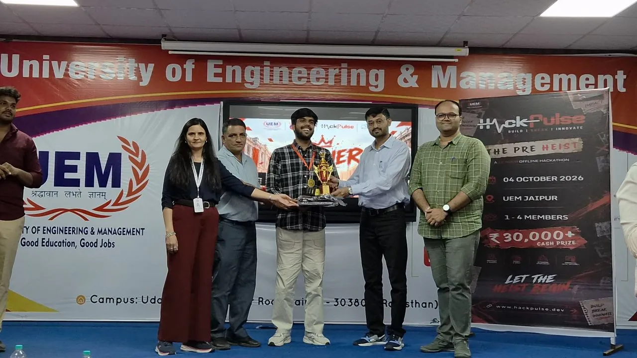 Rudra Pratap Singh receiving the 1st place trophy at HackPulse 2026, UEM Jaipur